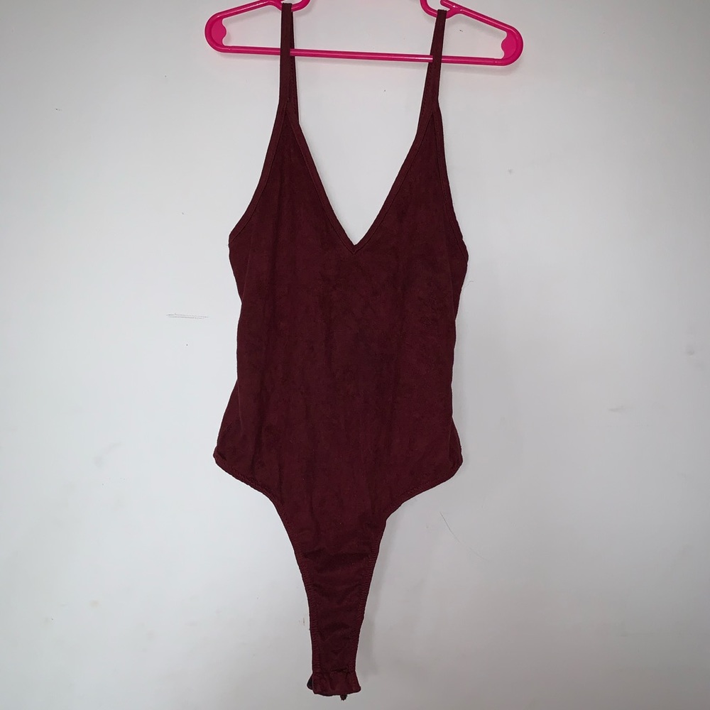 Dark red bodysuit. Soft to touch